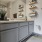 bathroom with wall shelves 
